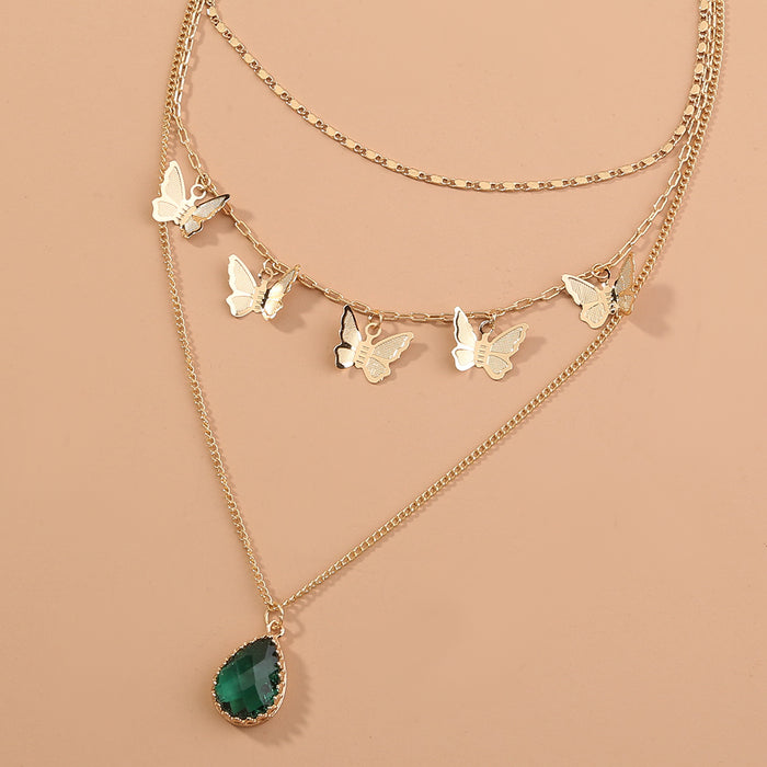 Layered Butterfly and Emerald Drop Necklace